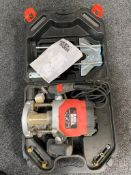 A cased Black and Decker router