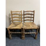 A pair of nineteenth century ladder backed chairs
