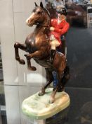 A Beswick figure of a Huntsman on Horse (Horse Rearing,