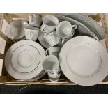 A box of Flirt by R&B white and silver dinner service