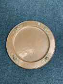 A large copper embossed plaque, diameter 61cm CONDITION REPORT: Apparently unmarked.