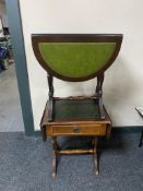 A mahogany leather topped sofa occasional table together with a flap sided table with inset leather