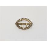 An antique 15ct gold pearl set buckle, 2.13g.