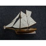 A wooden model of a two masted boat
