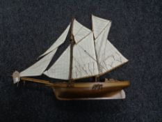 A wooden model of a two masted boat