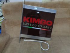 A illuminated Kimbo espresso Italiano shop sign