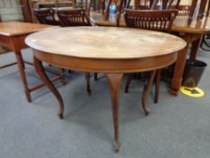 A nineteenth century mahogany oval occasional table