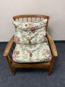 A mid century Danish teak armchair