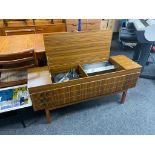 An HMV radiogram in teak cabinet