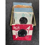 An Oriental style tin containing a small quantity of 45's, Cliff Richard,