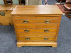 An Edwardian satinwood three drawer chest