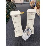 Two revolving Joules counter top display stands
