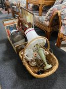 A wicker basket and wooden crate of crash helmet, rustic magazine rack, brass ware, table lamps,