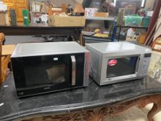 A Kenwood microwave together with an LG microwave