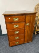 A mahogany ship's style five drawer chest fitted with a cabinet