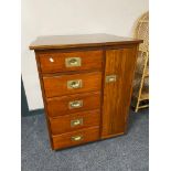 A mahogany ship's style five drawer chest fitted with a cabinet