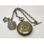 A heavy large silver pocket watch with silver dial on silver Albert chain CONDITION