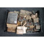 A crate of antique printing blocks relating to Newcastle upon Tyne