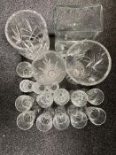 A tray of glass, wine glasses and vases,