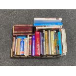 A box of hardback books,
