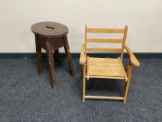 An oak stool together with a folding child's armchair