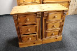 A pair of contemporary pine three drawer bedside chests