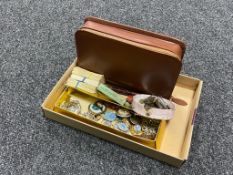 A box of leather cased gent's travel set, tea cards, brooches, Victorian copper coins,