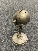 An early 20th century microphone on stand