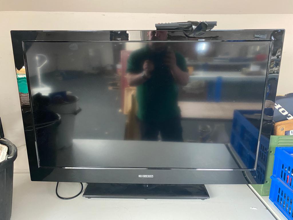 A Curtis 39" LCD TV with remote