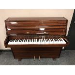 A mahogany cased mini piano by Zender