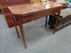 A nineteenth century mahogany tea table