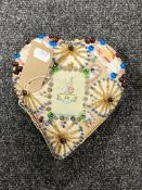 A heart shaped sweetheart pin cushion,