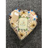 A heart shaped sweetheart pin cushion,
