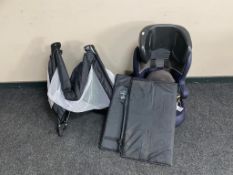 A child's car travel seat together with a folding travel cot