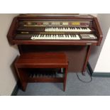 An electric GEM organ with stool