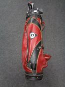 A Dunlop golf bag containing clubs