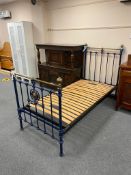 A painted wrought iron and brass 3' bed frame