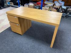 A contemporary ikea two drawer single pedestal desk