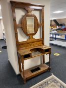 An Edwardian carved mahogany mirrored hall stand