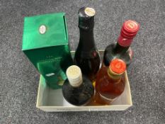 A box containing five bottles of alcohol, Bushmills Irish Whisky, Croft,