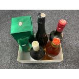 A box containing five bottles of alcohol, Bushmills Irish Whisky, Croft,