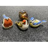 Four Royal Crown Derby bird paperweights with stoppers to include goldfinch, blue tit,