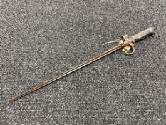 An antique spike bayonet