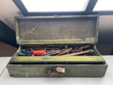 A joiner's tool box containing hand tools