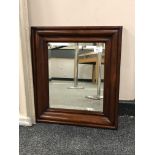 A mahogany-framed bevel-edged mirror, 34 cm x 29 cm.