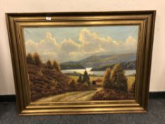 Continental school - oil on canvas depicting a view across a valley