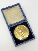 A silver gilt medal for the 1908 London Olympics (Judges), inscribed to J Lewis.