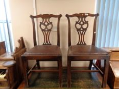 A pair of nineteenth century mahogany dining chairs