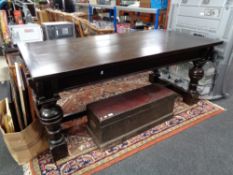 An Edwardian oak refectory dining table