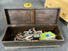 An antique pine tool box containing joiner's tools